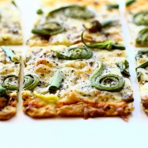 Flatbread with Fiddlehead Ferns, Onion Scapes and Pecorino