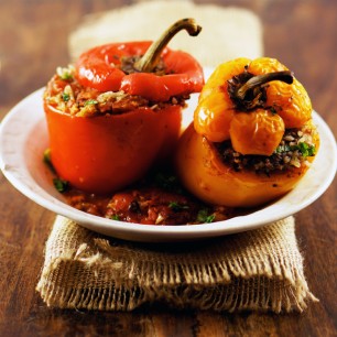 Lamb-Stuffed Peppers in Spiced Tomato Sauce