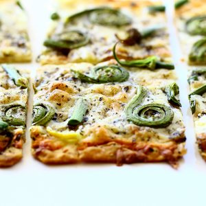 Flatbread with Fiddlehead Ferns, Onion Scapes and Pecorino